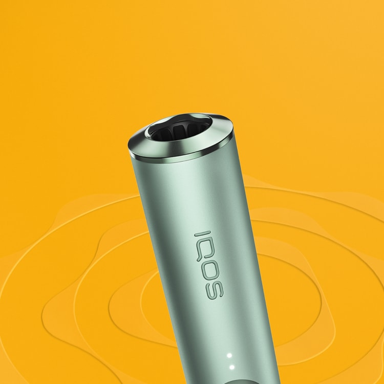 Un dispositivo IQOS ILUMA color Jade Green.