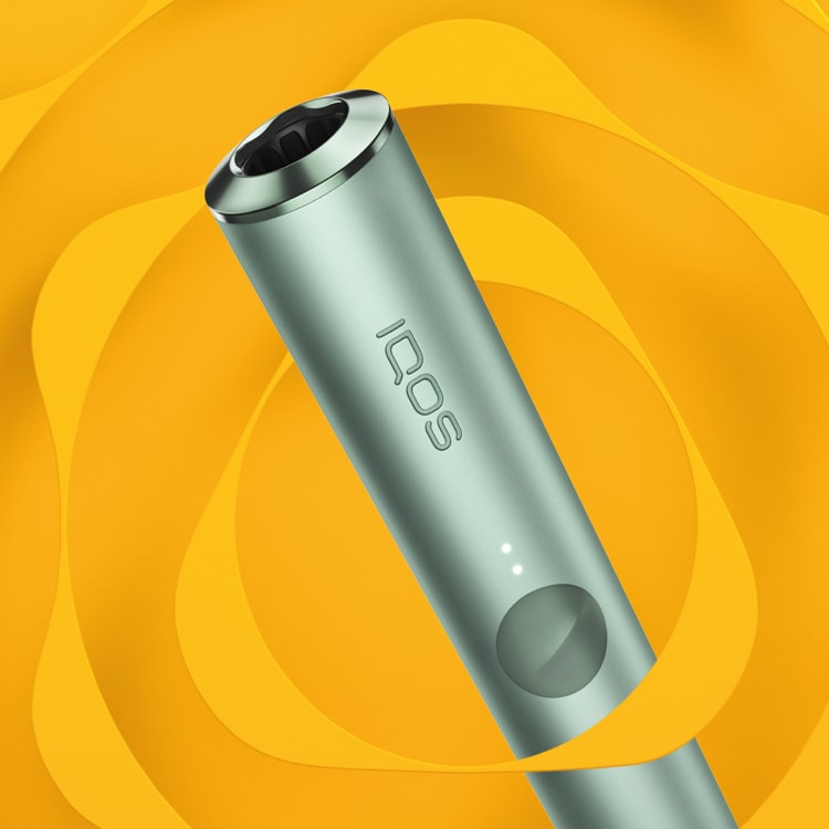 Un dispositivo IQOS ILUMA PRIME color Jade Green.